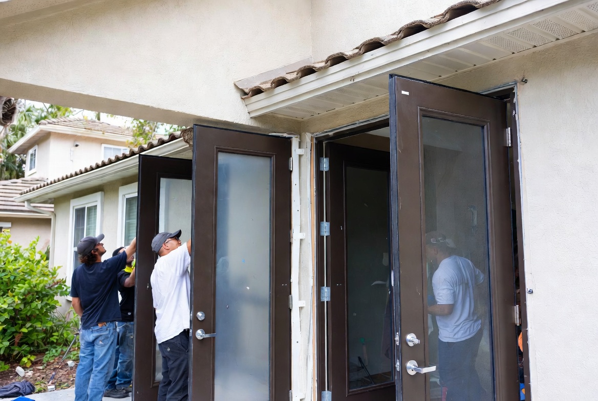 Impact door installation crew working on Fort Lauderdale home